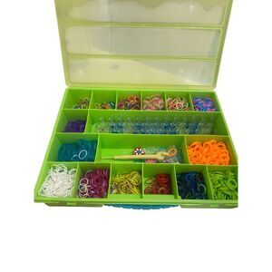 Loom band kit with box of assorted bands and a bag of loom bands charms and acce